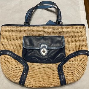 Coach. Natural Straw Tote Bag navy blue trim and pocket